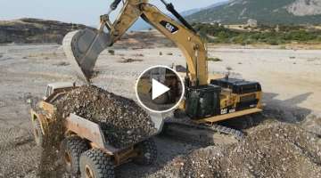 Caterpillar 374D Excavator Loading Caterpillar 730 And 740 Articulated Dump Trucks - Interkat SA