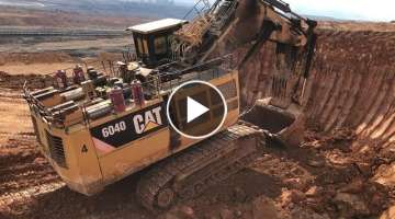 Cat 6040 Mining Excavator Loading Hitachi EH3500 Dumpers