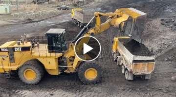 Caterpillar 992G Wheel Loader Loading Coal On Trucks With One Pass