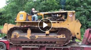 Caterpillar D9G donkey start and unloading off a low loader