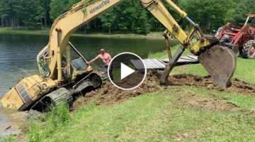 Excavator stuck in the lake