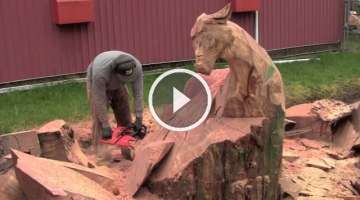 Jordan Anderson carving bull elk with chainsaw