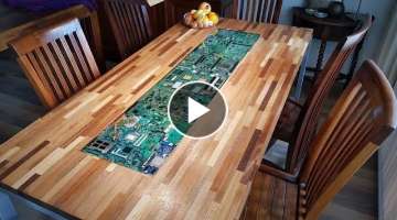 Circuit boards with lights in epoxy in a table