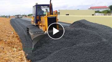 Bulldozer Spreading Gravel Building Foundation New Big Road And Dump Truck Unloading Gravel ...