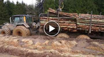 Valtra forestry tractor stuck, wet conditions