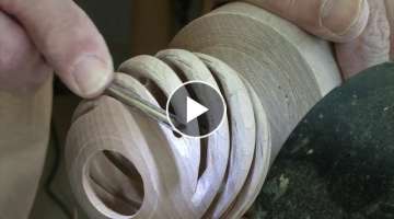 Woodturning a hollow spiral globe ornament