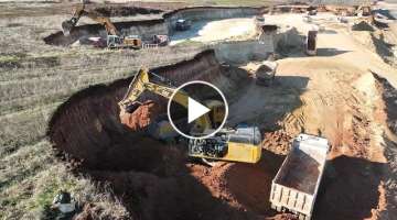 Caterpillar 352F & Liebherr 964 Excavators Loading Trucks - Aerial View - Ascon Ltd