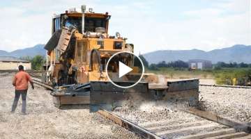 Hypnotic Process of Clearing Ballast on 1000 Mile Rail Tracks